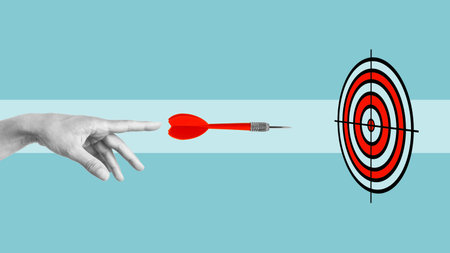 Challenge, Strategy, Focus,Target and objective business targeting concept. The hand throwing a dart aiming to the targetの写真素材