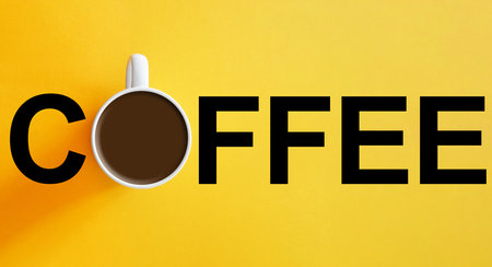 The cup of coffee on orange background for coffee break. Concept of art, drink, taste, colorful design. Poster with copy space for adの写真素材