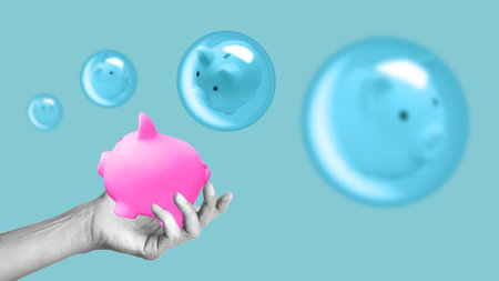Piggy banks floating in a bubble as Economic bubble danger and financial burst. Savings protection, banking, retirement and investment insurance conceptsの写真素材