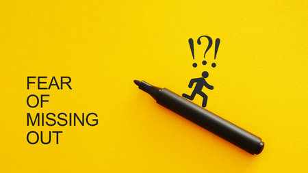 Fear of missing out is shown using the text FOMOの写真素材