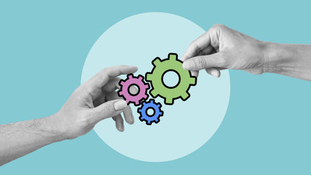 Two hands manipulating gears as symbol of creativity and teamwork. Concept of business, planning,...