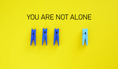 You're not alone - motivational phrase is shown using a textの写真素材