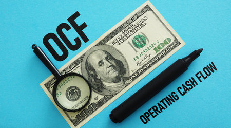 Operating Cash Flow OCF is shown using a text as business concept