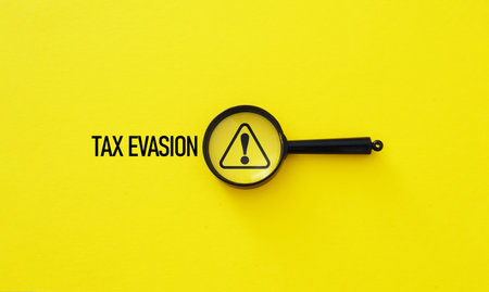 Tax Evasion is shown using a text as financial and legal conceptの写真素材