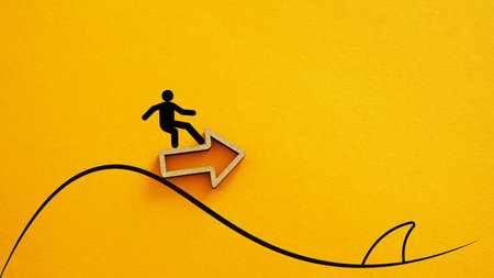 Business risk metaphor, man surfing on arrow over danger, shark fin concept. Metaphor of danger and opportunity, risk and challenge, person balancingの写真素材