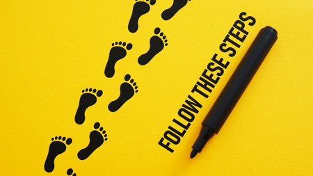 Education and skill growth. Business concept for new beginnings are shown using a text Follow these stepsの写真素材