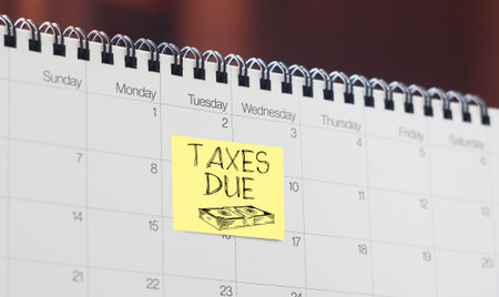 Taxes due calendar reminder notice of money payment date. Pay time, budget or financial planの写真素材