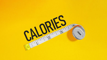 Measuring Tape Representing Fitness and Calorie Consciousness. Calories measure and diet for the weight control.の写真素材