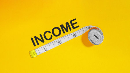 The image symbolizes the concept of income and its measurement or managementの写真素材