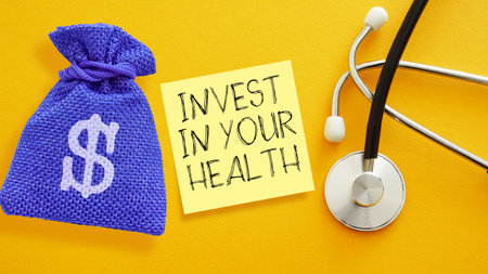 Invest in Your Health - Healthcare Investment Motivation with Dollar Bag and Stethoscope. Financial Wellness and Medical Finance Conceptの写真素材