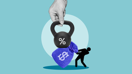 Debt Load and Rising Interest Rates as Financial Pressure concept. Struggling with Increasing Heavy Interest Rates - Debt Burden Metaphorの写真素材