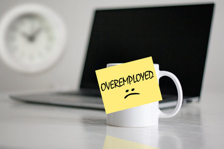 Overemployed Remote Work Concept, Managing Multiple Jobs Simultaneously, Digital Nomad Productivity, Work From Home Multitasking, Income Diversification and Burnout Risk in Modern Online Careersの写真素材