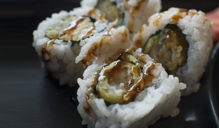 Sushi Shrimp Tempura. closeup soft selective focus over Black Background. space for textの写真素材