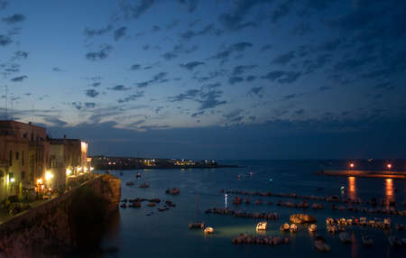 night shot of seaport at Otranto, Italyの写真素材