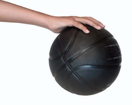 Isolated Hand Holding A Basketball Ballの写真素材