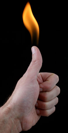 humorous picture of a flaming thumb on a black background