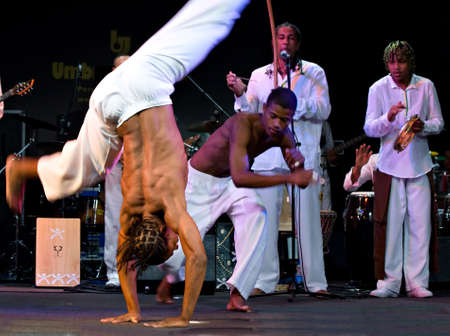 PERUGIA, ITALY - JULY 12, 2010 - Projecto Axé (music, dance and capoeira) from Brazil on stage at Umbria Jazz Festival - July 12, 2010 in Perugia, Italyのeditorial素材