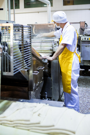 Workers in the food production factoryのeditorial素材