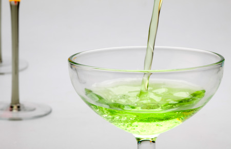 Beverages pouring into the glassの写真素材