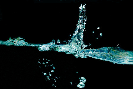 water splash on black backgroundの写真素材