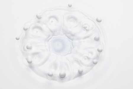 Milk splash on white backgroundの写真素材