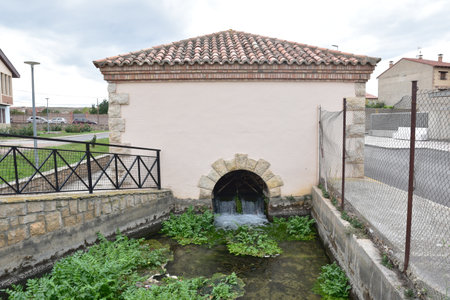 A small water fountain in a small town in Cella, Spain.の写真素材