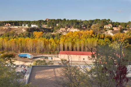 View from the top of the hill to the village in autumn.の写真素材