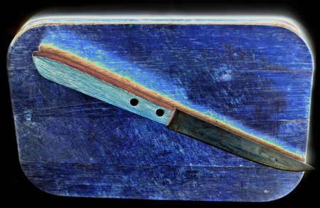 blue trenher and knifeの写真素材