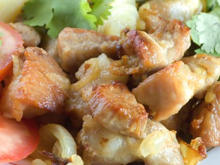 Stewed meat with a potato and tomatoesの写真素材