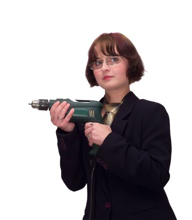 young woman with drill. Isolated on whiteの写真素材
