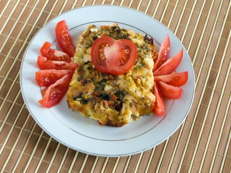 baked pudding with cheese, meat and vegetablesの写真素材