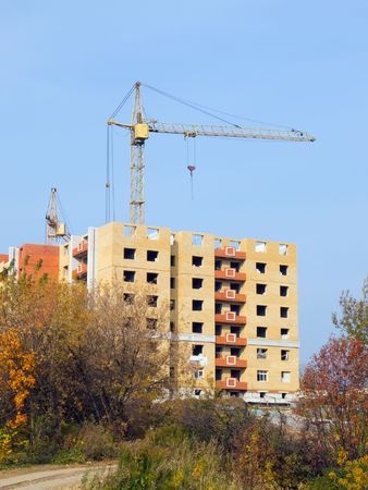 crane on construction of building new houseの写真素材