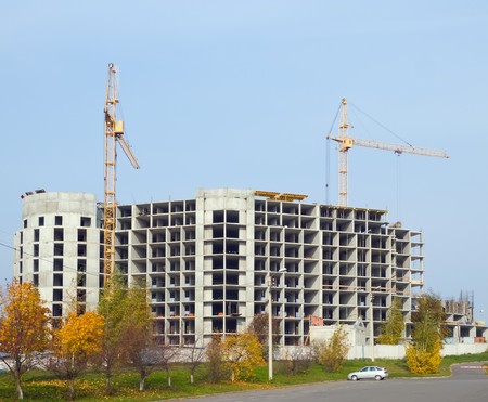 crane on construction of building new houseの写真素材