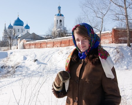 girl in russian traditional clothes  against  Russian landscapeの写真素材