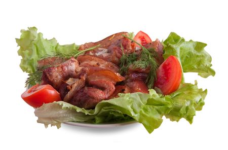 Stewed meat with tomatoes in dish. Isolated on whiteの写真素材