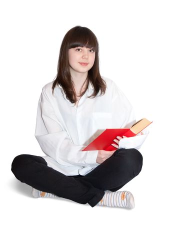 young girl with book. Isolated on whiteの写真素材