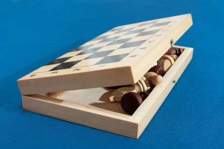 chess figures  in Chess board  on blue textile