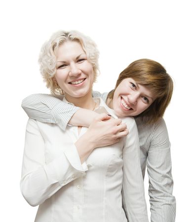 Two young happy girls over white backgroundの写真素材