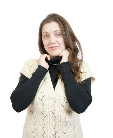 Portrait of Long-haired   girl dressed in sweater over whiteの写真素材