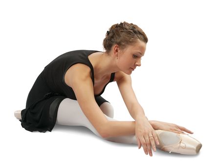 dancer in ballet shoes exercising in pointe over whiteの写真素材