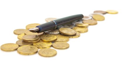 Pen on euro coins  over white background の写真素材