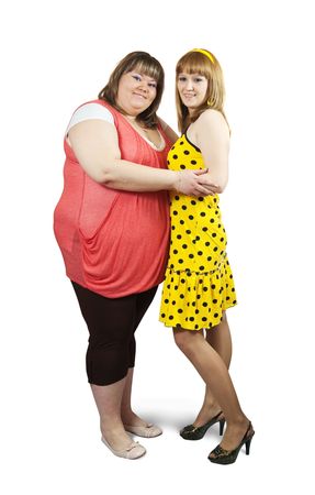 Two different girlfriends together over white backgroundの写真素材