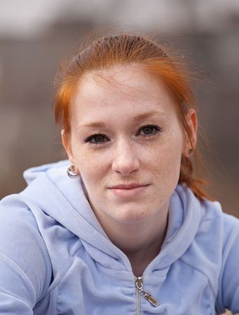 Portrait of the woman with freckles  against outdoorの写真素材
