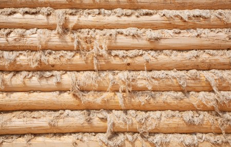 Structure of a wall from wooden logsの写真素材