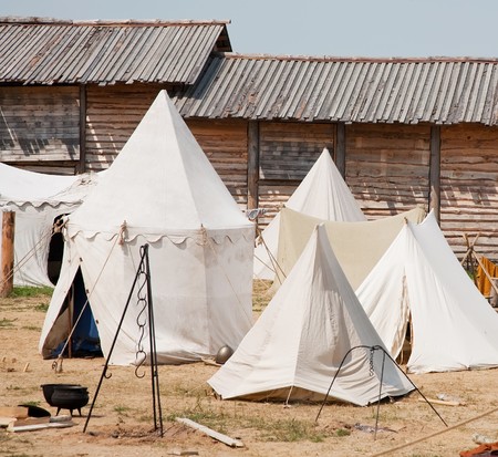  Few knight tents placed near fortness wall during historical festivalの写真素材