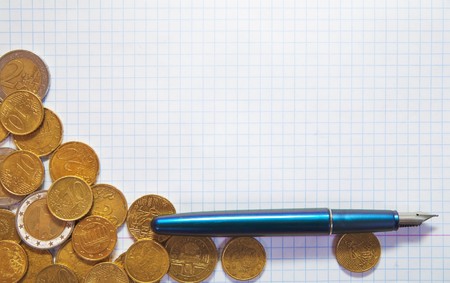 Background of few euro coins on padの写真素材