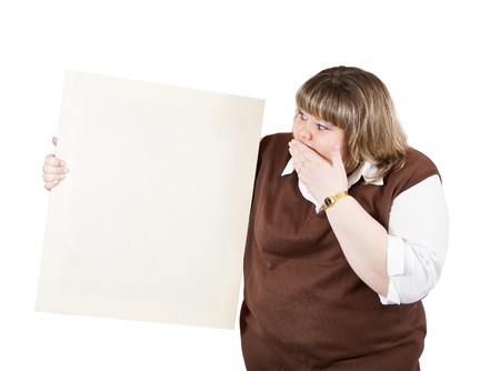large girl holds blank canvas. It is isolated on a white background の写真素材