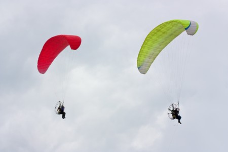 Two Paraglider  soaring against cloudy sky  ib summerの写真素材