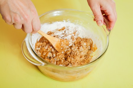 Closeup of woman making  dough in dish.
One of the stages of cooking of  honey cake.  See seriesの写真素材