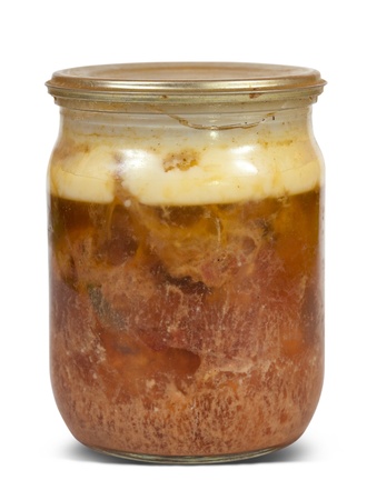tinned stew meat in glass. Isolated over white backgroundの写真素材